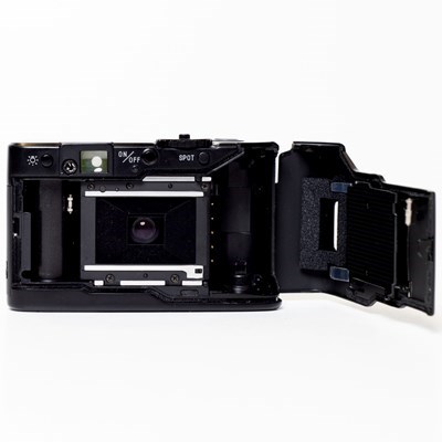 Product: Minolta SH TC-1 35mm Film Camera: black 70th anniversary w/- case grade 9