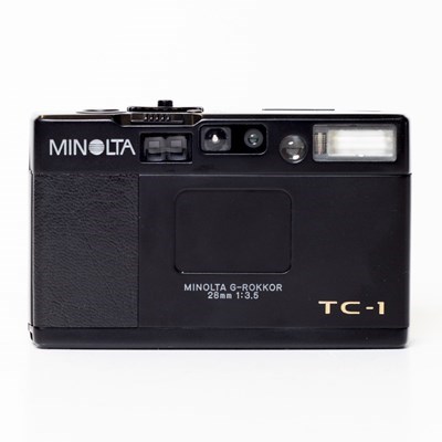 Product: Minolta SH TC-1 35mm Film Camera: black 70th anniversary w/- case grade 9