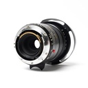 Leica 28-35-50mm f/4 Tri-Elmar-M ASPH lens(6 bit code) w/- hood + E49 UVafilter Grade 8