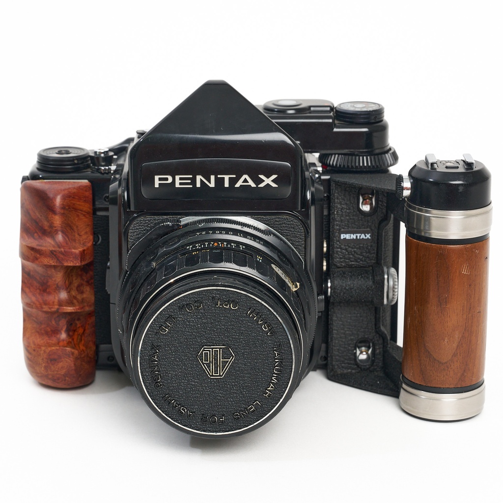 Pentax 67 body w/- metered prism + 105 f/2.4 + 45mm/135mm/165mm/200mm/300mm f/4 Grade 8