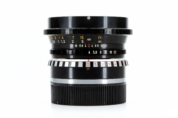 Leica 35mm f/4 PA-Curtagon-R lens w/- E60 UVa filter Grade 9 (circa 1984)