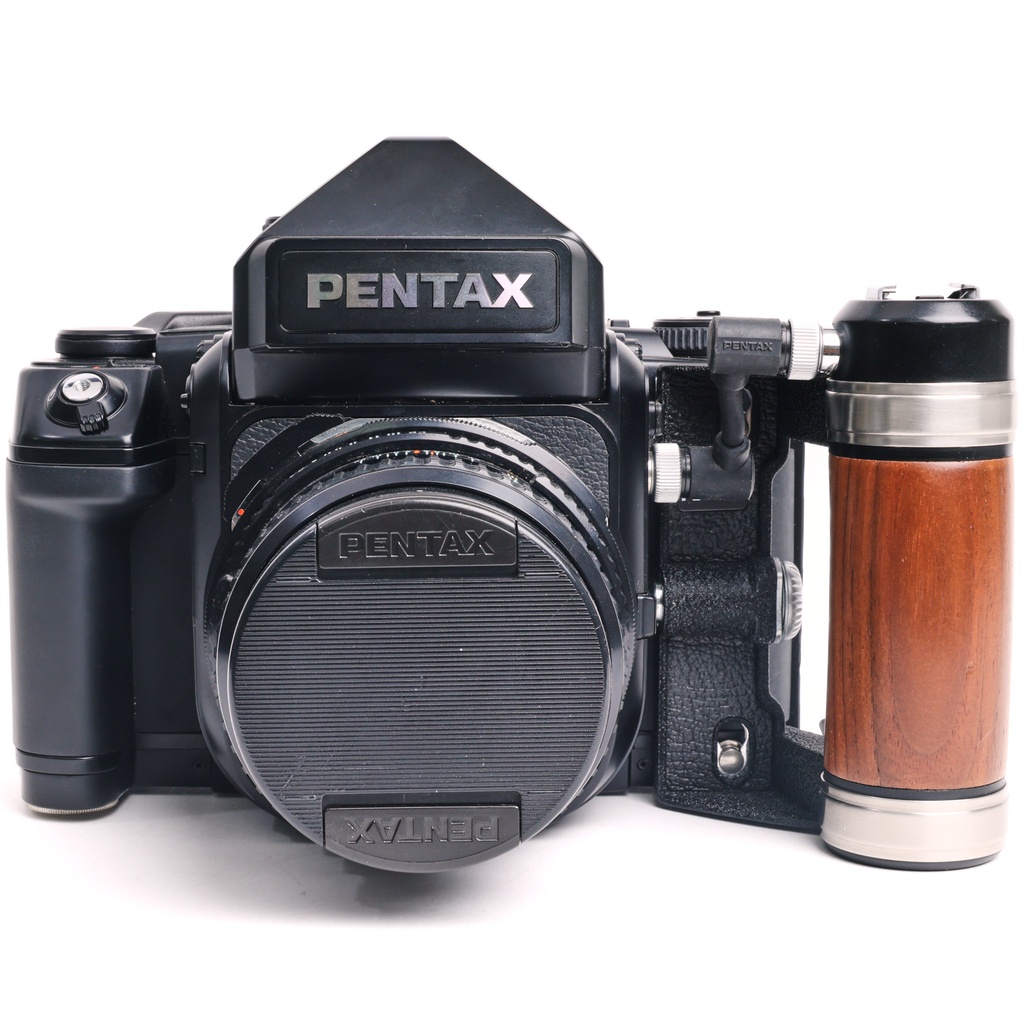 Pentax 67 II body w/- wooden grip + original strap + 105mm f/2.4 - Grade 9
